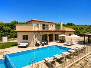 an image of a villa with a swimming pool at Villa Christel in Lachi