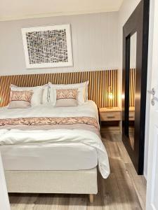 a bedroom with a large bed in a room at Villa Myklebust in Olden