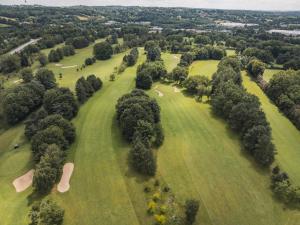 an overhead view of a park with trees and grass at Domaine Golf Saint-Lazare in Limoges