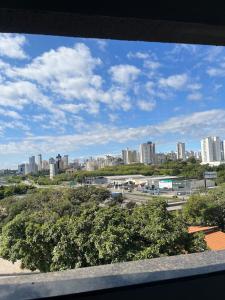 a view of a city skyline from a building at Seu espaço in Sorocaba