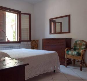 Giường trong phòng chung tại Casa Ebe