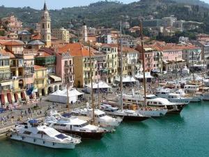a group of boats docked in the water in a harbor at Casetta sul Porto in Imperia