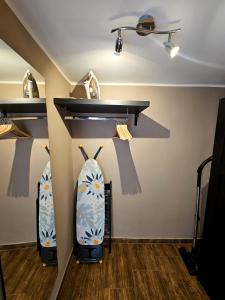 a room with two surfboards on a wall at BARI SOUL old town in Bari