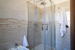 a bathroom with a shower and a sink at ISA ROOMS Bed&Breakfast in Bovalino Marina