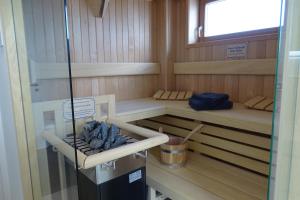 a small cabin with two bunk beds in it at Sturmvogel in Olpenitz