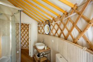 a bathroom with a sink and a shower at Yurta Glamping B&B San Leone Agrigento - tra mare e pineta in Agrigento +53 photos