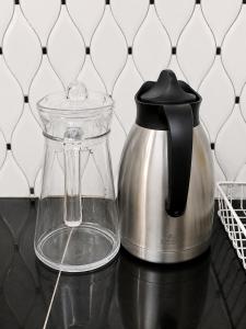 a blender sitting on top of a counter at Home23 Apartments in Jinja