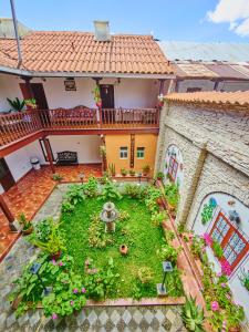 an aerial view of a house with a garden at Hostal Catequil in Cajamarca +11 photos
