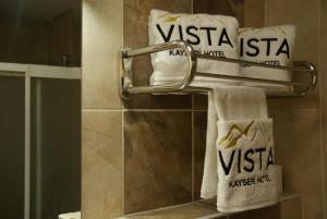 a bathroom with some towels on a towel rack at Vista Kayseri Hotel in Kayseri