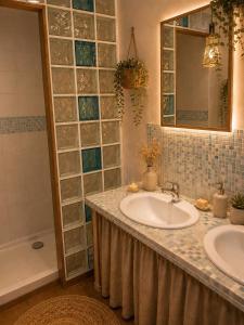 a bathroom with a sink and a mirror and a tub at Le CLOS D'ETRETAT in Les Loges +21 photos