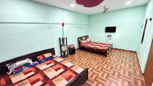 a room with a bed and a couch in it at Gravity Groups Core - La Maison Villa in Pondicherry