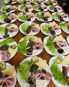 a group of plates of food on a table at Hotel Restaurant Real in Kolgecaj
