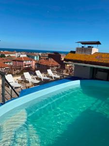a large swimming pool on top of a building at Мирели in Ravda