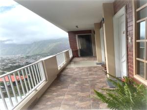 a balcony of a house with a view at FerG in Lligua +1 photo