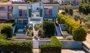 an aerial view of a house with bushes at Verde Villas in Skala Potamias