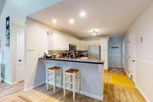 a kitchen with a counter top and a refrigerator at 37 Moonraker Road in Ocean Pines