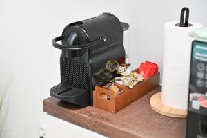a shelf with a suitcase and watches on it at Brko's Place Sinj in Sinj +10 photos