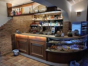 a kitchen with a counter with food on it at Domus del Borgo Antico in Ginosa