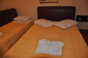 Letto o letti in una camera di Hotel Drosia