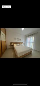 a bedroom with a large bed in a room at Vera dream Las Marinas LAGUNA BEACH in Vera +23 photos