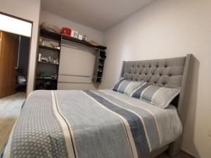 a bedroom with a large bed in a room at Relax at the lake - Pool - Pet friendly - WiFi in Chantepec +75 photos