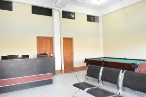 a room with a pool table and a desk at Nexus Hotel & Coworking in Copacabana +19 photos
