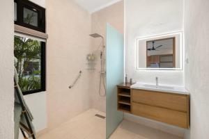 a bathroom with a sink and a shower at Villa Peuchere in Santa Cruz +37 photos