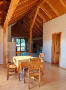 a dining room with a table and chairs at Chalet-Loft im Schwarzwaldhof Wutachblick in Bonndorf im Schwarzwald