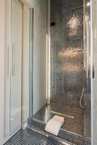 a bathroom with a shower with a toilet in it at Ca'santoro 3 in Agerola +24 photos