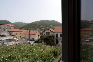 a view of a city with buildings and a street at Ca'santoro 3 in Agerola