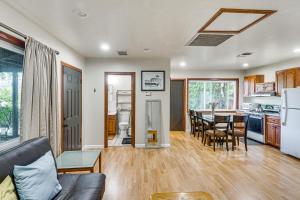 a living room and kitchen with a couch and a table at Quiet Patio! La Cañada Month-Long Studio in La Canada Flintridge