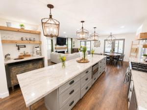 a large kitchen with a large island in the middle at Wranglers Rest Ranch in Arroyo Grande