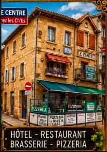 a building with a sign in front of it at Chez les chtis de vayrac in Vayrac