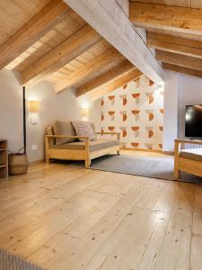 a living room with a couch and a tv at Giada Apartments in Moneglia +60 photos