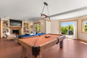 a large living room with a pool table at Waterfront Escape Game Room Dog Friendly in Chatham
