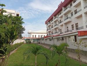 a view of the courtyard of a building at Zeus Paradise Hotel Abuja in Abuja