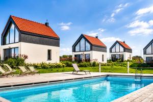 an image of a house with a swimming pool at Rybical 42 in Rybical