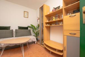 a small living room with a table and a couch at House Punta in Kraj