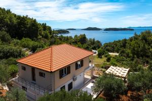 an aerial view of a house with an orange roof at Villa Franciska in Blato