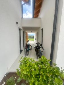 a hallway with bikes parked on the side of a building at Sitara's Chalet in Bled