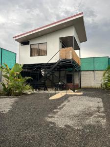 a house is being built on top of a building at Altima Arenal Volcano View in Tanque
