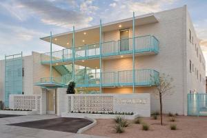 a building with balconies on the side of it at DTPH Cozy Corner - Pool & Parking in Phoenix