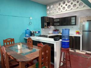 A kitchen or kitchenette at The Grindio Hostel Még 8 kép
