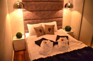 Posteľ alebo postele v izbe v ubytovaní Atelier Zakopane Apartamenty pod Giewontem