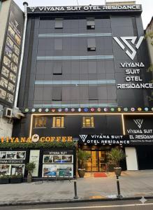 a building with a sign on the side of it at Viyana Suite Hotel in Istanbul