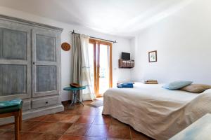 Postel nebo postele na pokoji v ubytování Casa La Liccia