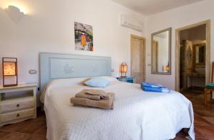 Postel nebo postele na pokoji v ubytování Casa La Liccia