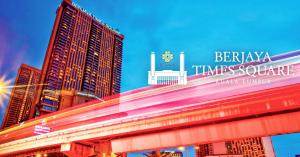 a sign for the bellingham times square sign in front of buildings at Hotel Sentral Pudu @ City Centre / Bukit Bintang in Kuala Lumpur