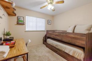 a bedroom with a bed and a ceiling fan at Mountain House in Mariposa