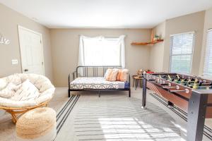 a living room with a foosball table and agamuitous at Mountain House in Mariposa +24 photos
